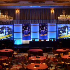 10’ tall scenic design placed on the stage to maximize space, Drake Hotel, Chicago